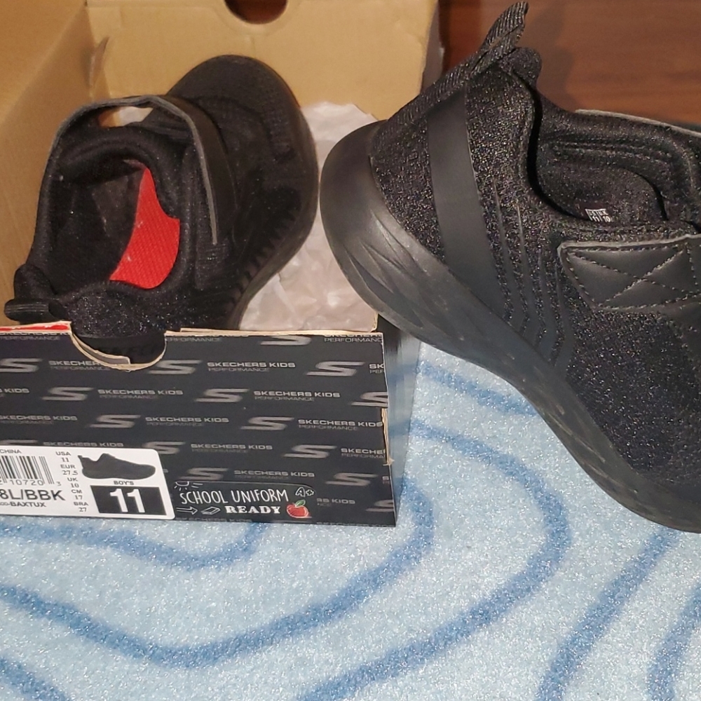 Black sketcher shoes